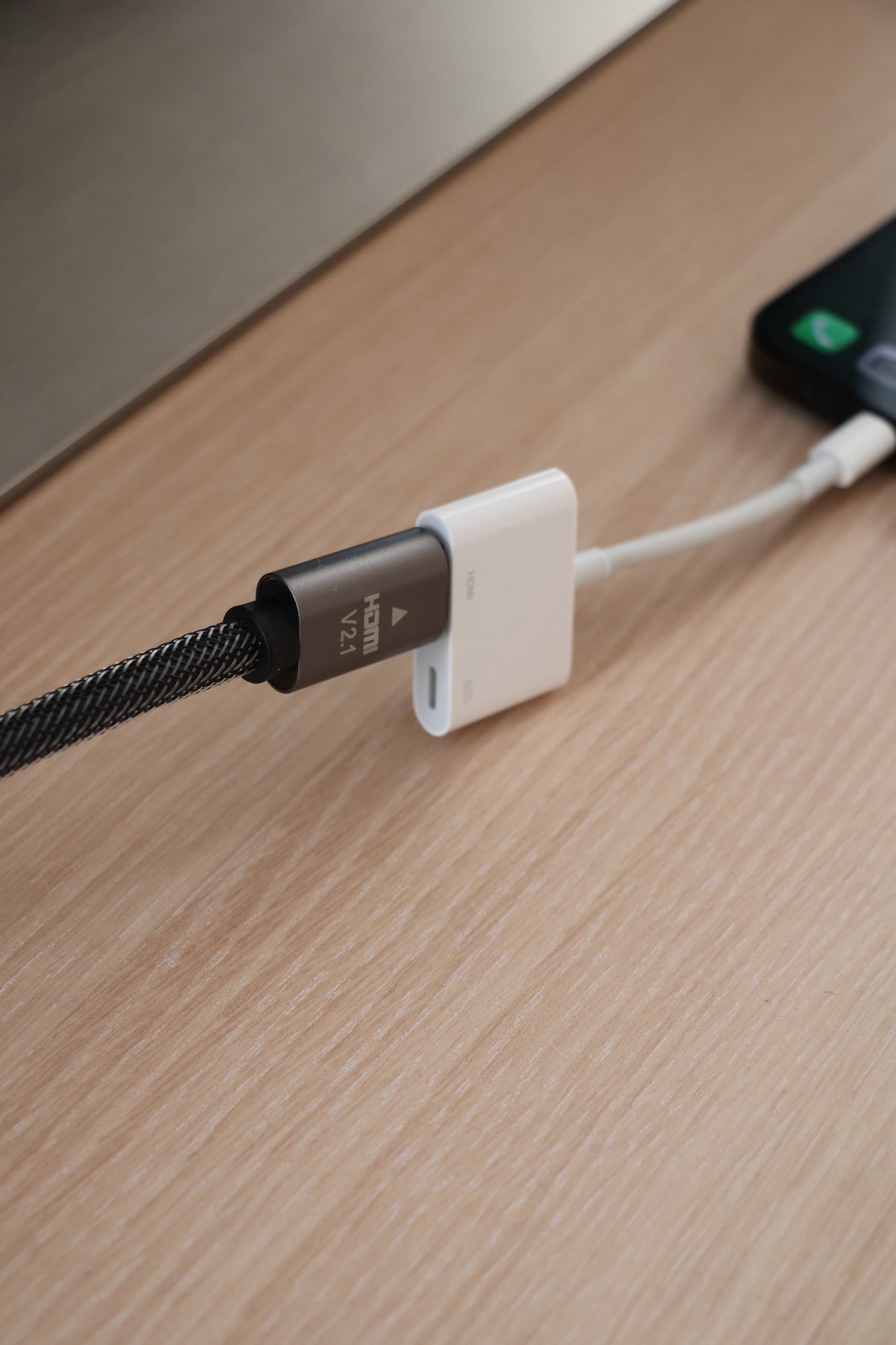 Connect an HDMI cable to iPhone's Lightning adapter