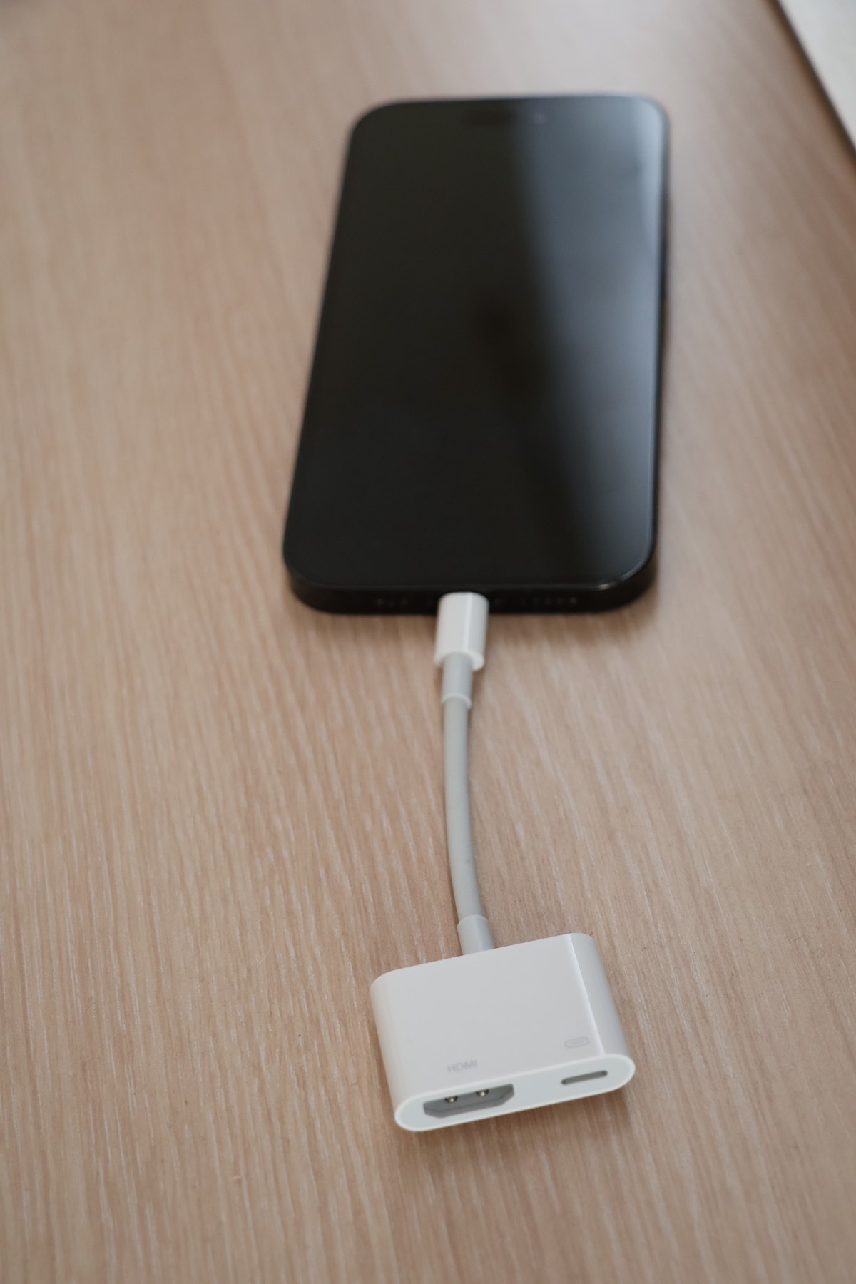 Connect the adapter to your iPhone