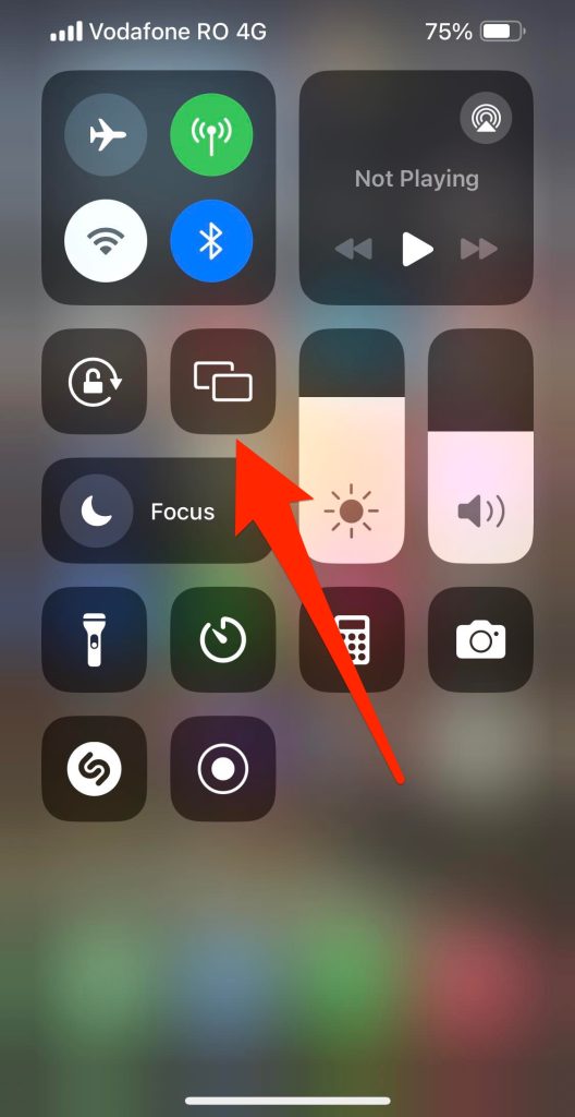 Tap on the Screen Mirroring tile in Control Center on your iPhone