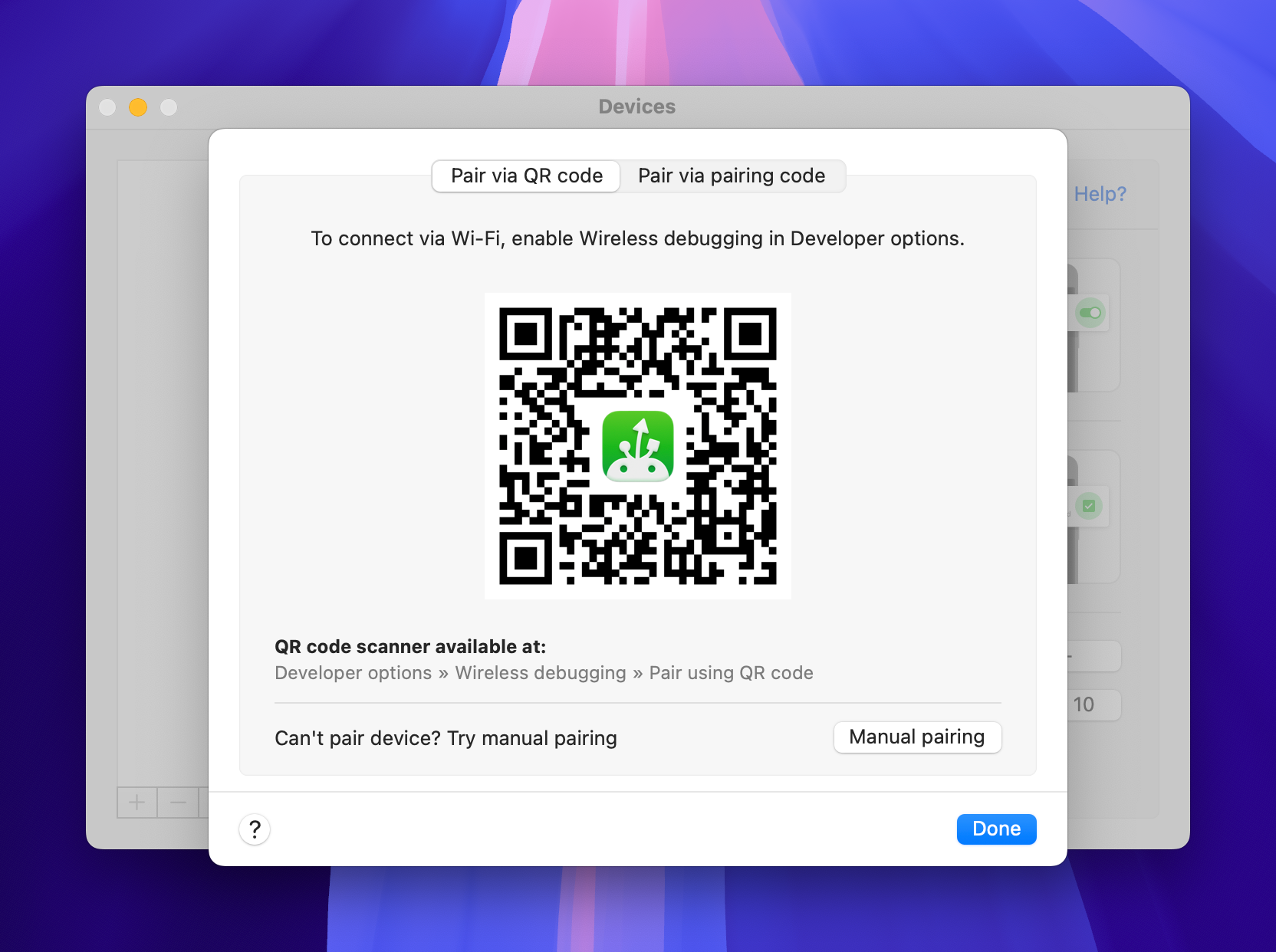 A QR code in the MacDroid app is demonstrated