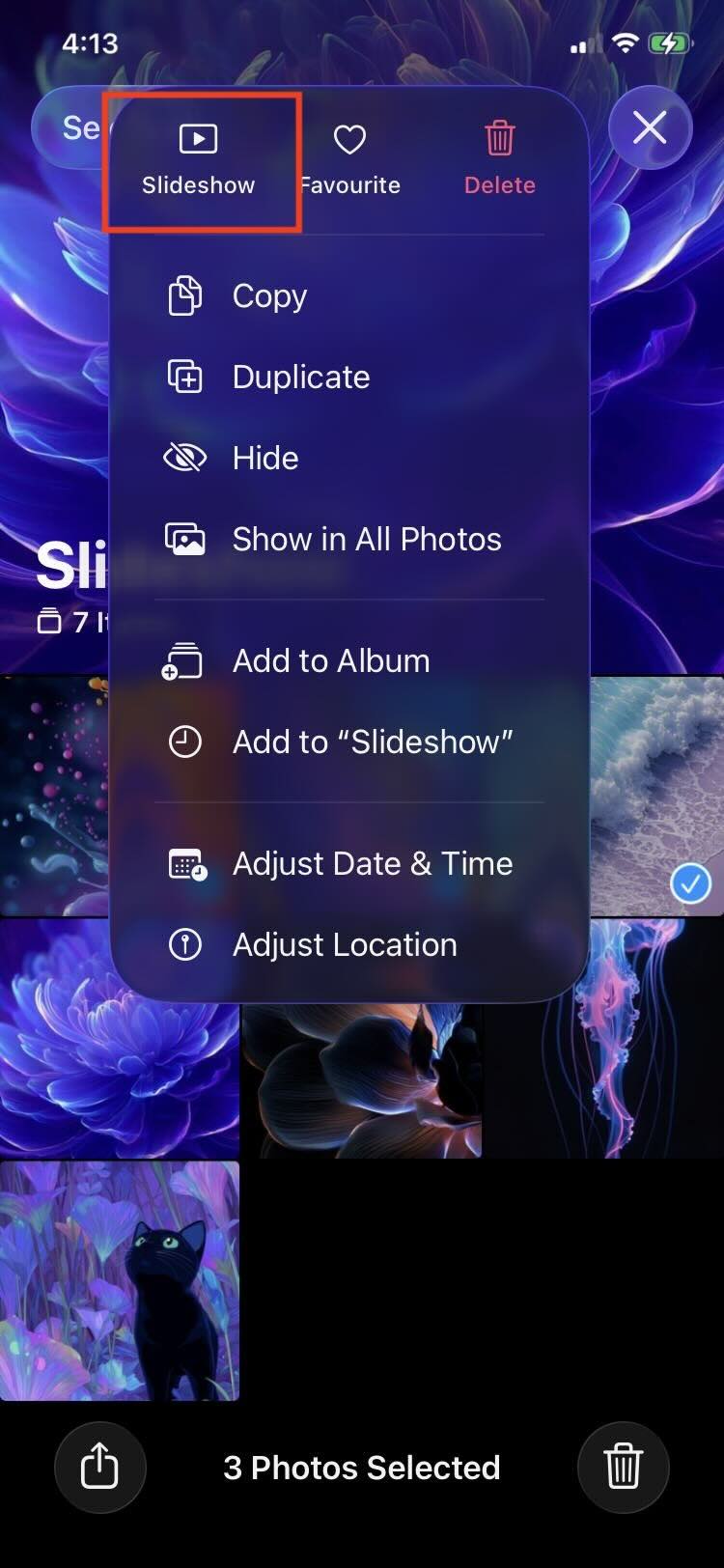 Tippe in der Fotos-App auf dem iPhone auf die Option „Diashow“